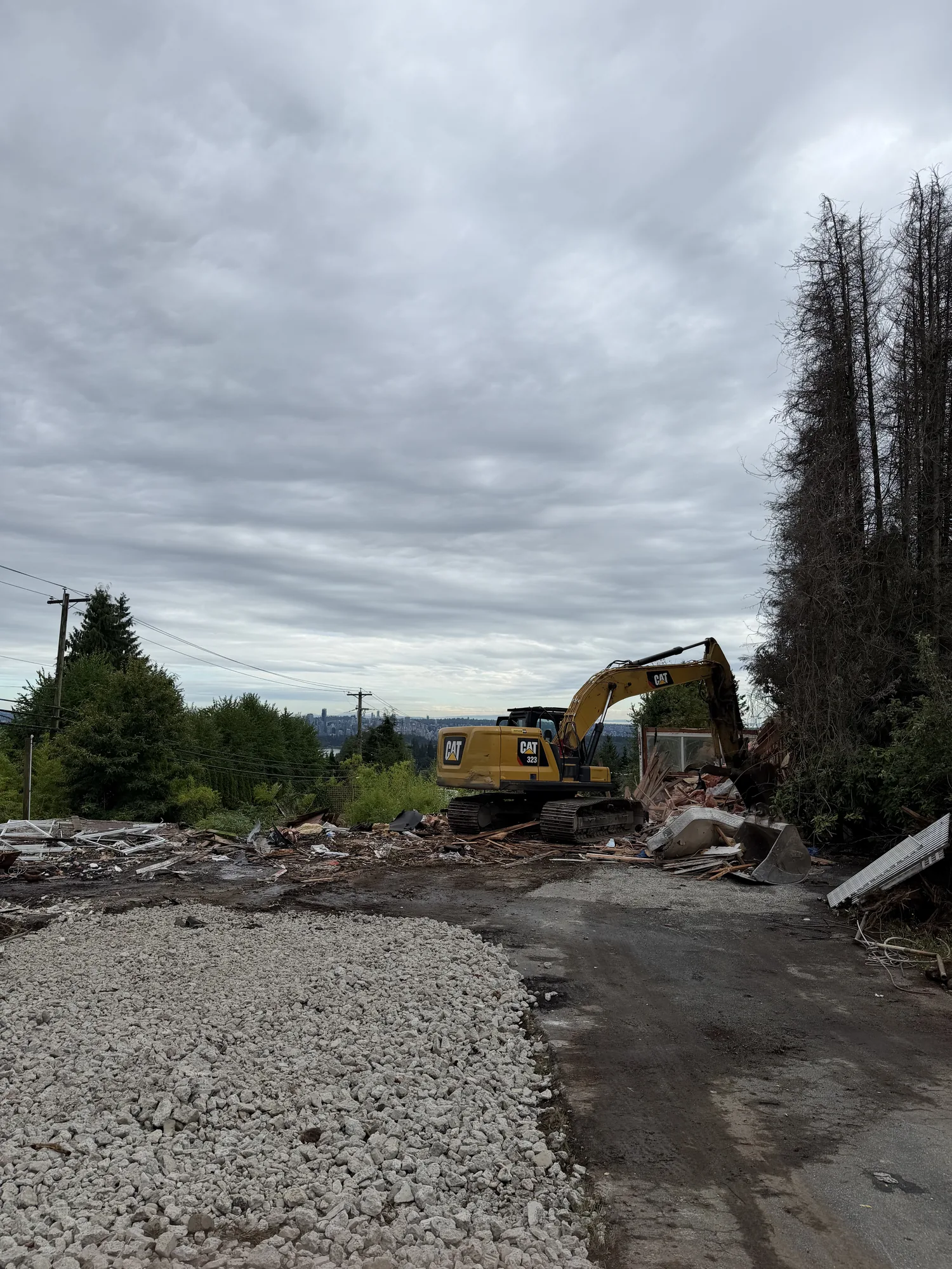 Excavator during a building teardown in Vancouver BC