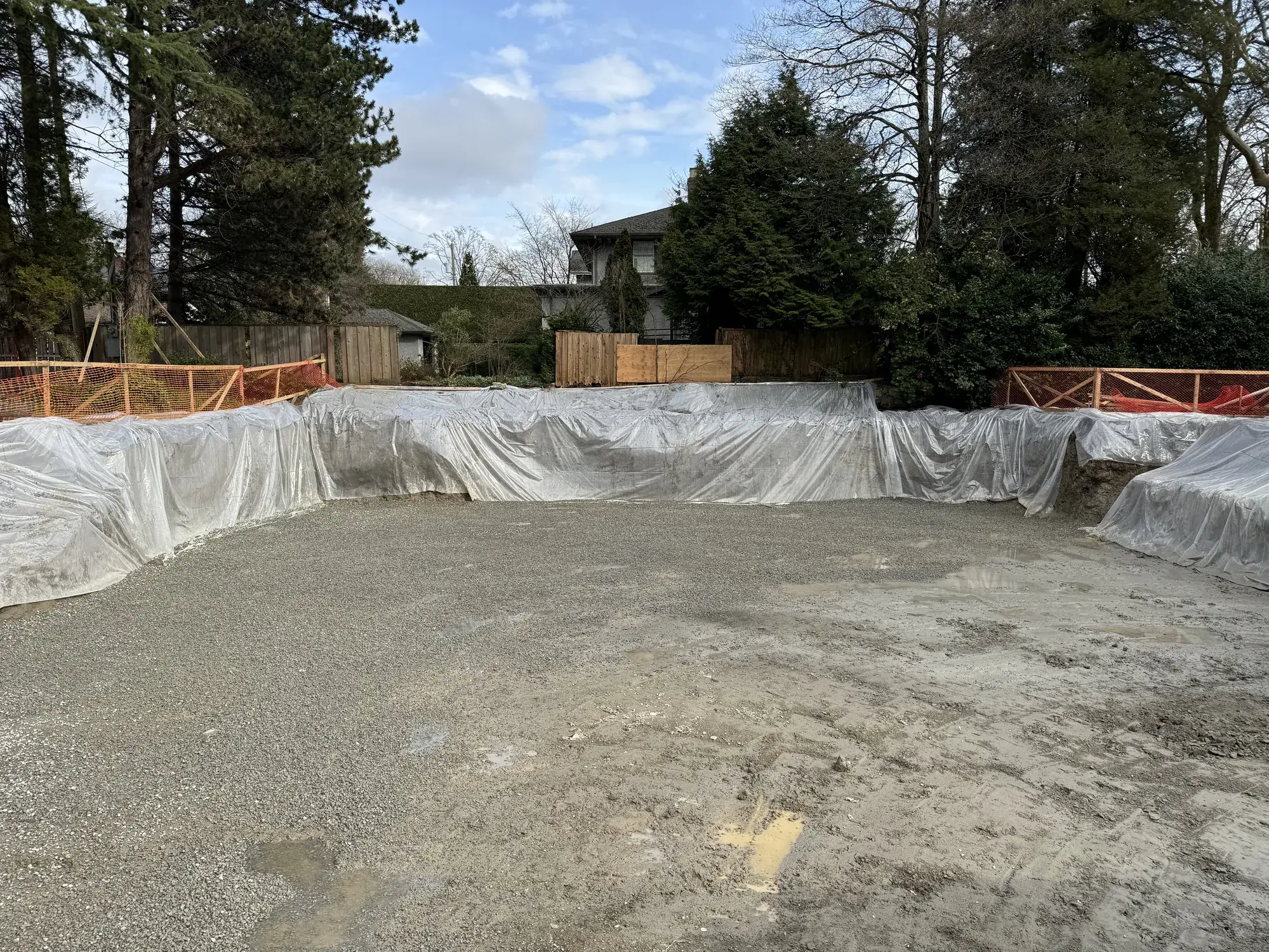 Excavator digging a foundation trench in Richmond BC