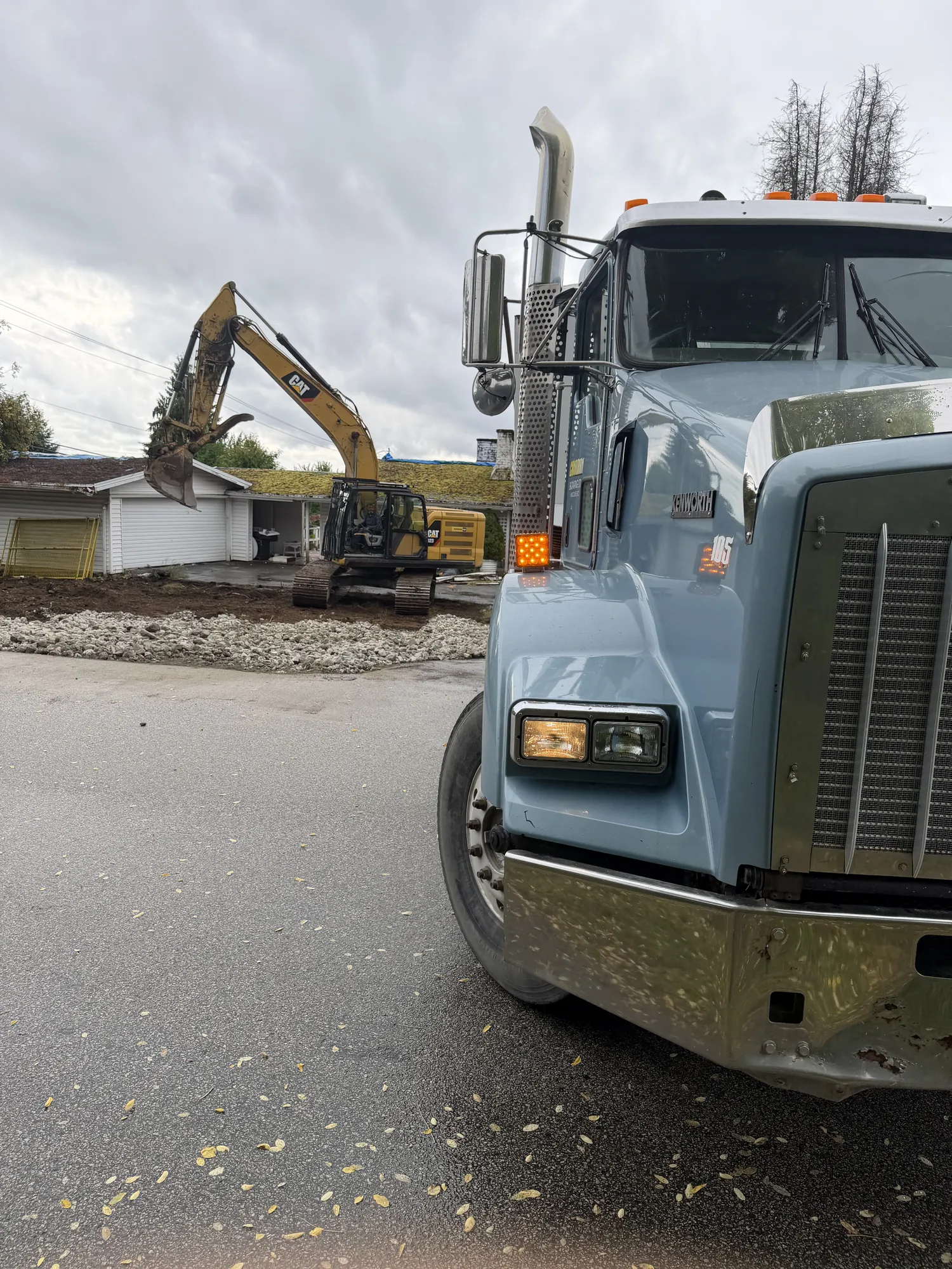 Slinger placing fill to grade in Delta BC