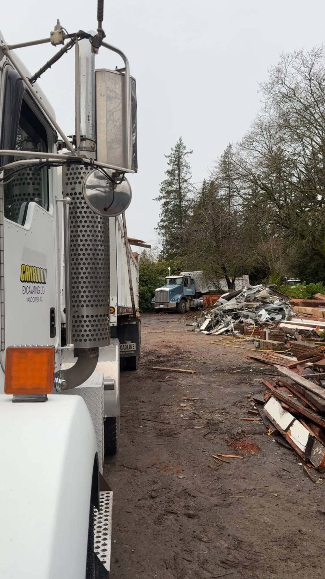 Truck hauling material onto a Delta BC construction site