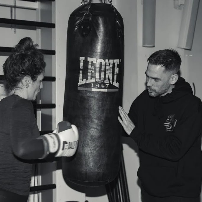 Andy James personal trainer coaching a client in Clapham