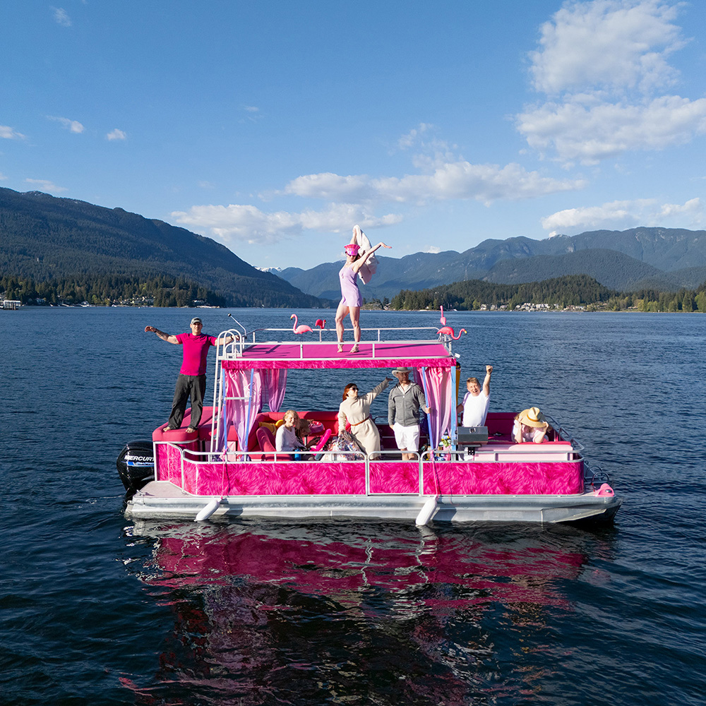 Top view of pink pontoon boat and double decker interior with custom decor in Vancouver.