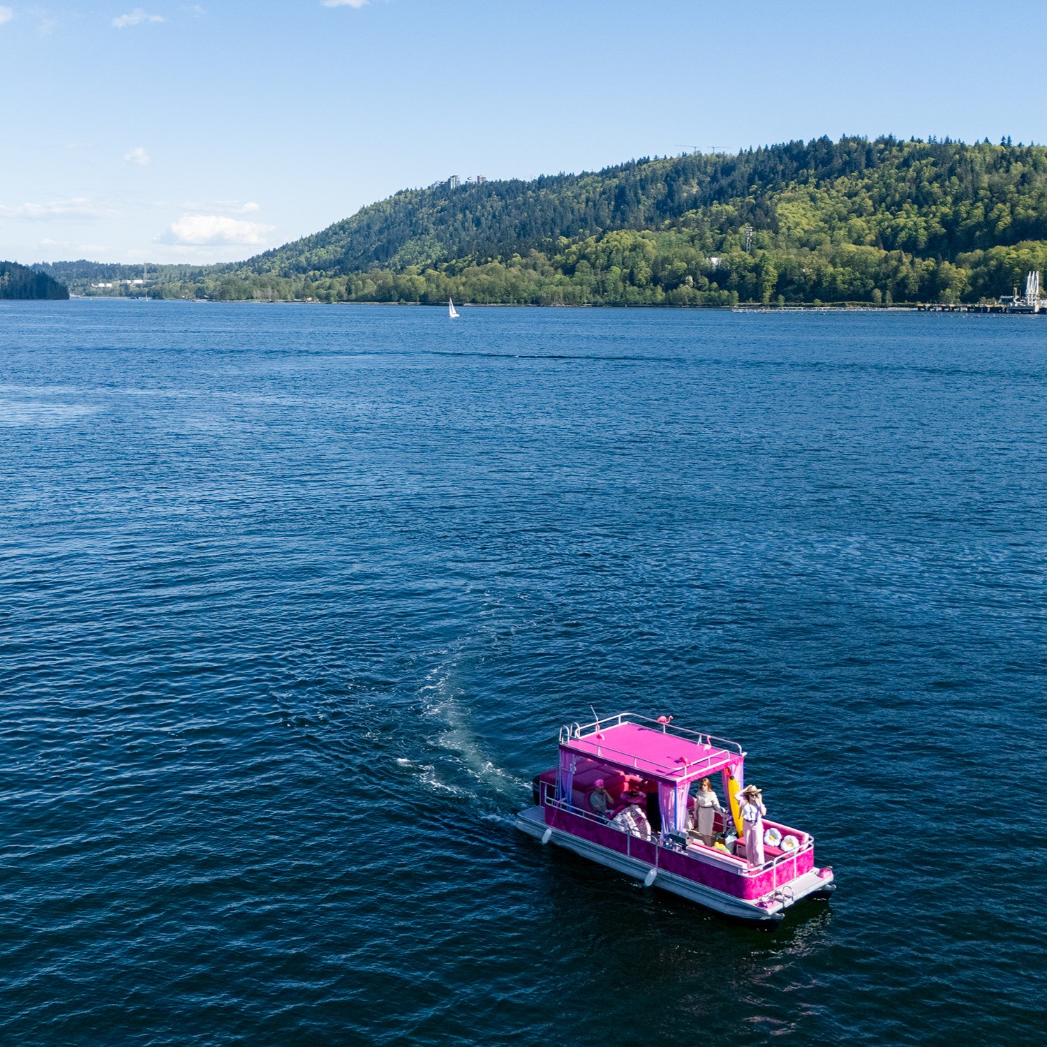 Top view of pink pontoon boat and double decker interior with custom decor in Vancouver.
