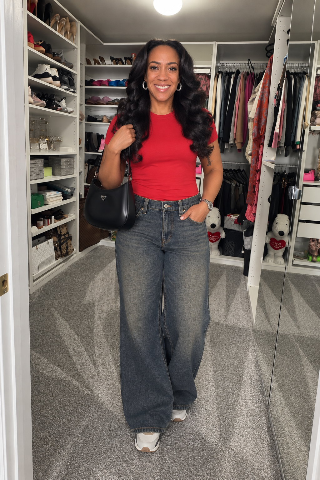 AI-created image of TT in her original closet, wearing Petite After Hours Low Rise Baggy Jeans in Dark Wash, My Everyday Crew Neck Tee in Red, styled with Nike Nike Air Max 90 in Cream II/Pencil Point/Off White/Wolf Grey, Prada Prada Cleo brushed leather shoulder bag in Black, Anne Klein Polished Bracelet Watch in Silver-Tone, PAVOI Bold Chic Hoops in White Gold.