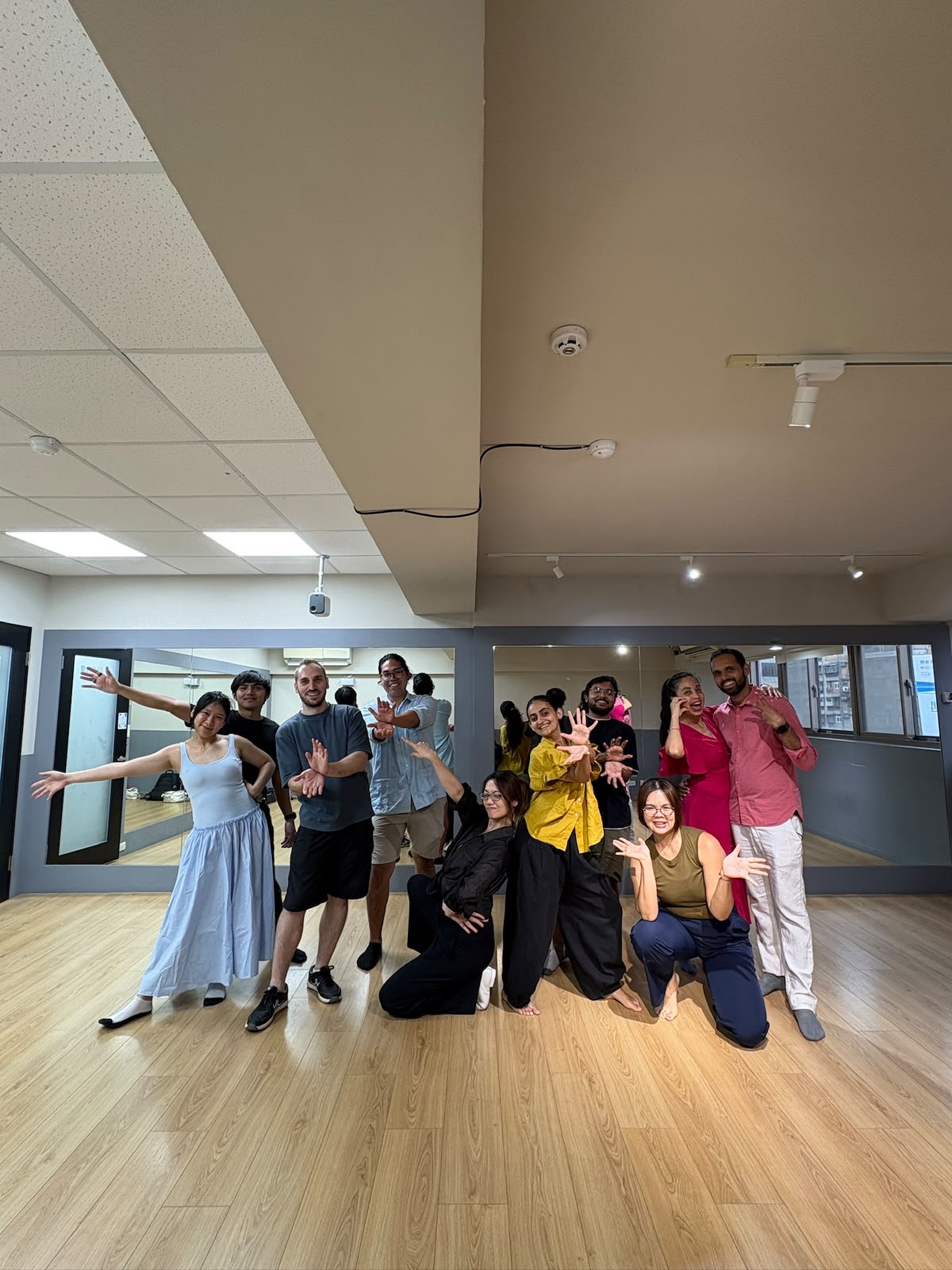 Students striking fun poses after a Laya Movement dance class in Taipei