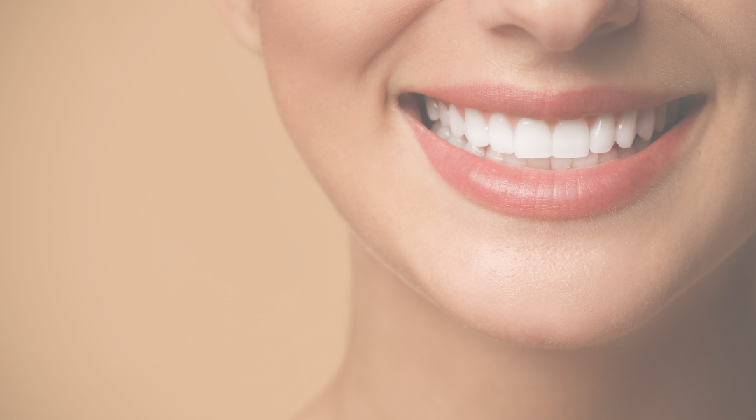 long black haired woman smiling close-up photography