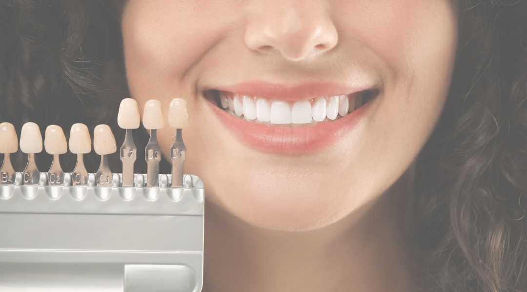 long black haired woman smiling close-up photography