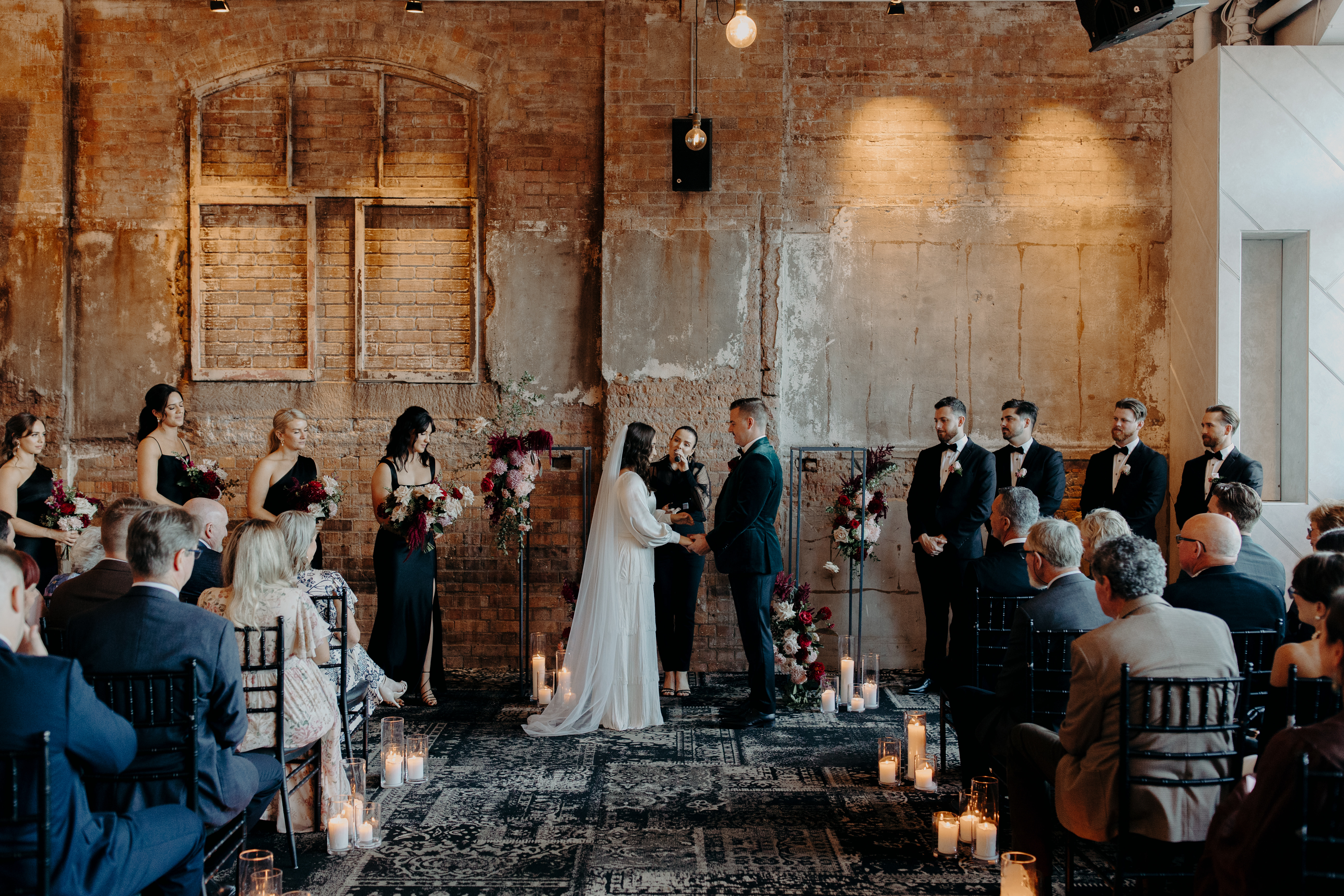 A couple in a barn doorway