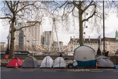 homeless tents in front of the London eye