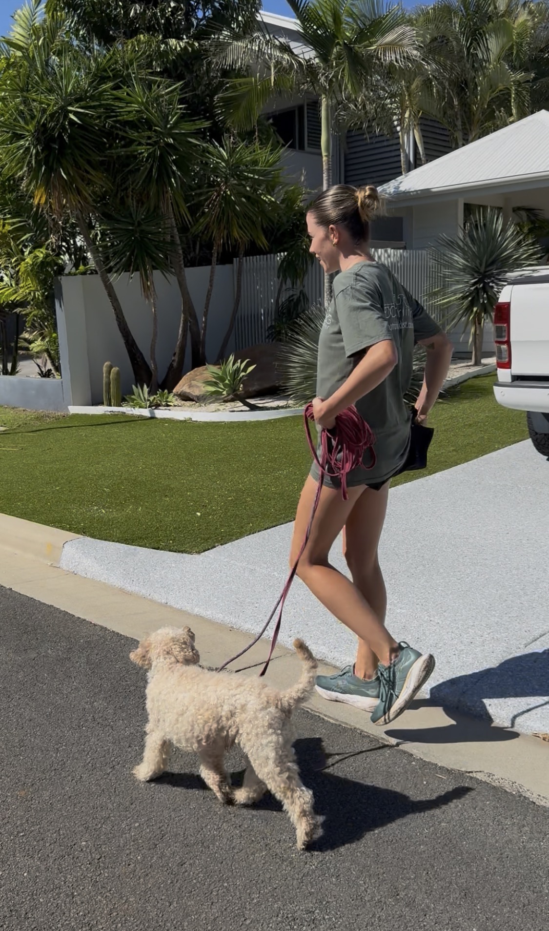 Trainer standing with dog