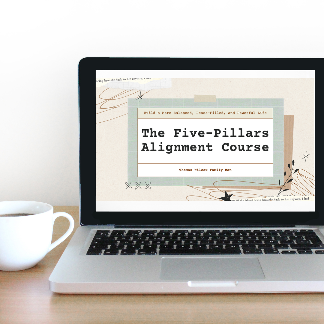 Laptop displaying the Five Pillars Alignment Course on screen, with coffee cup beside it—fatherhood alignment course image.