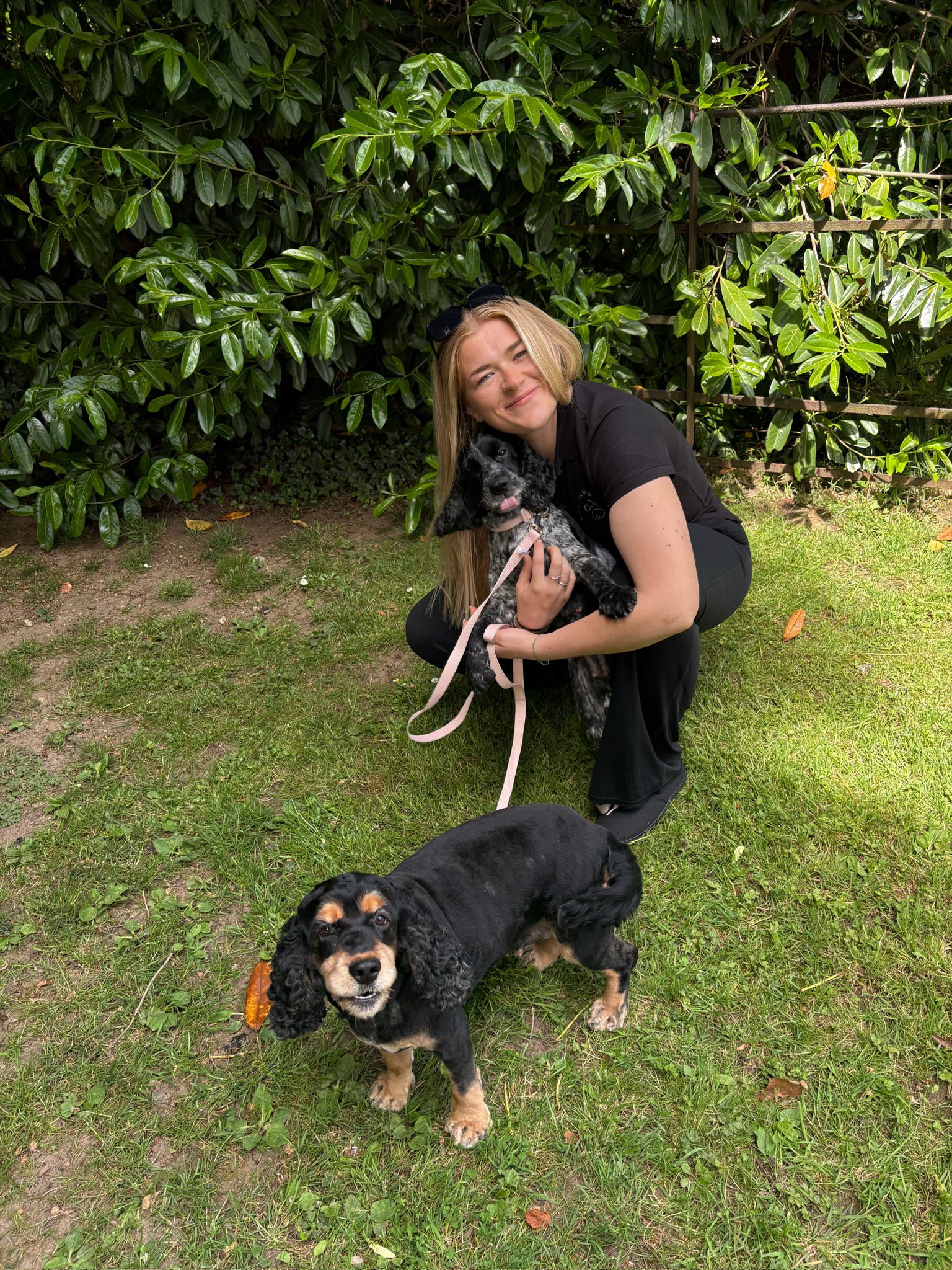 Amy posing with dogs