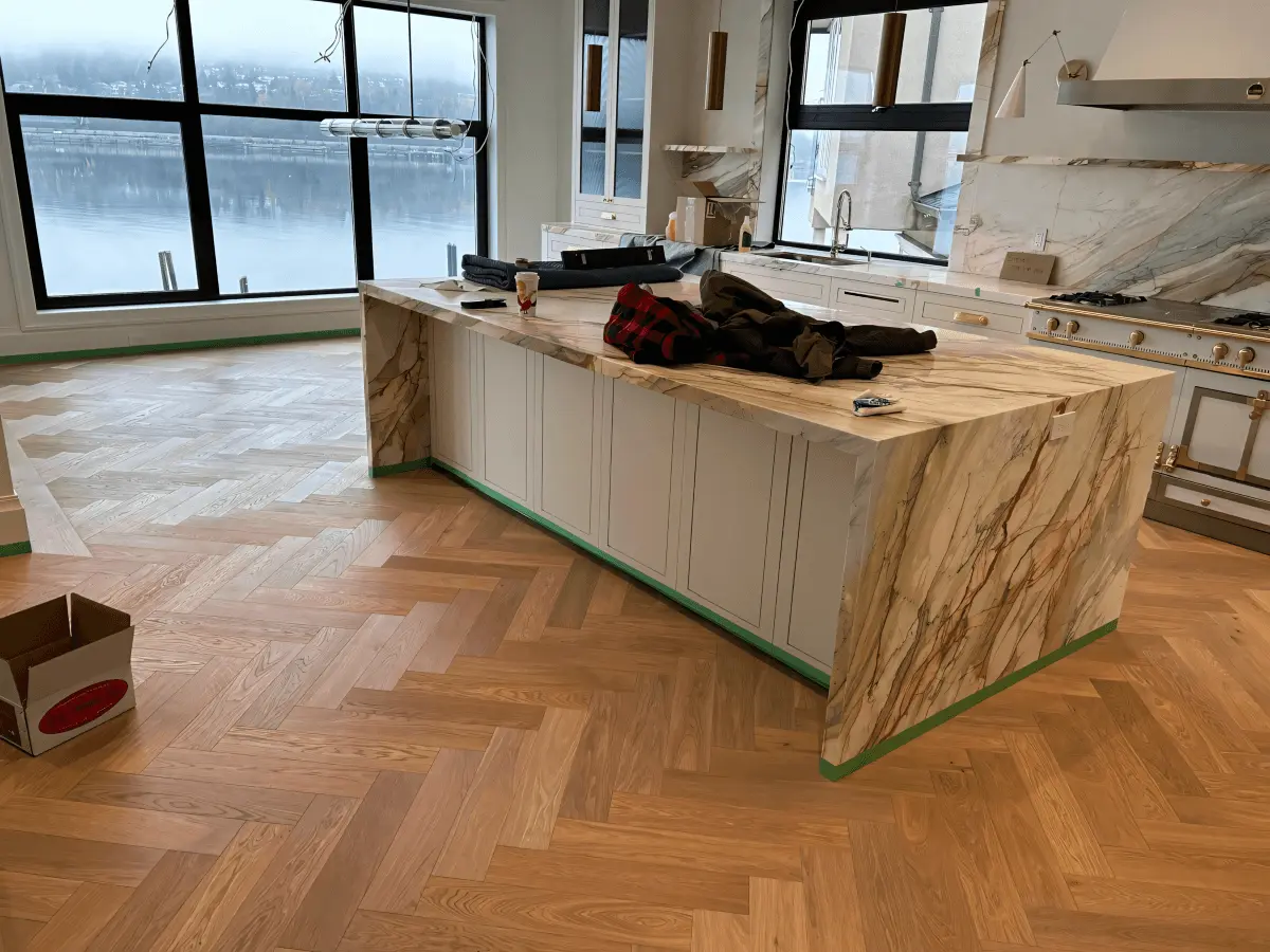 Herringbone hardwood waterfront kitchen
