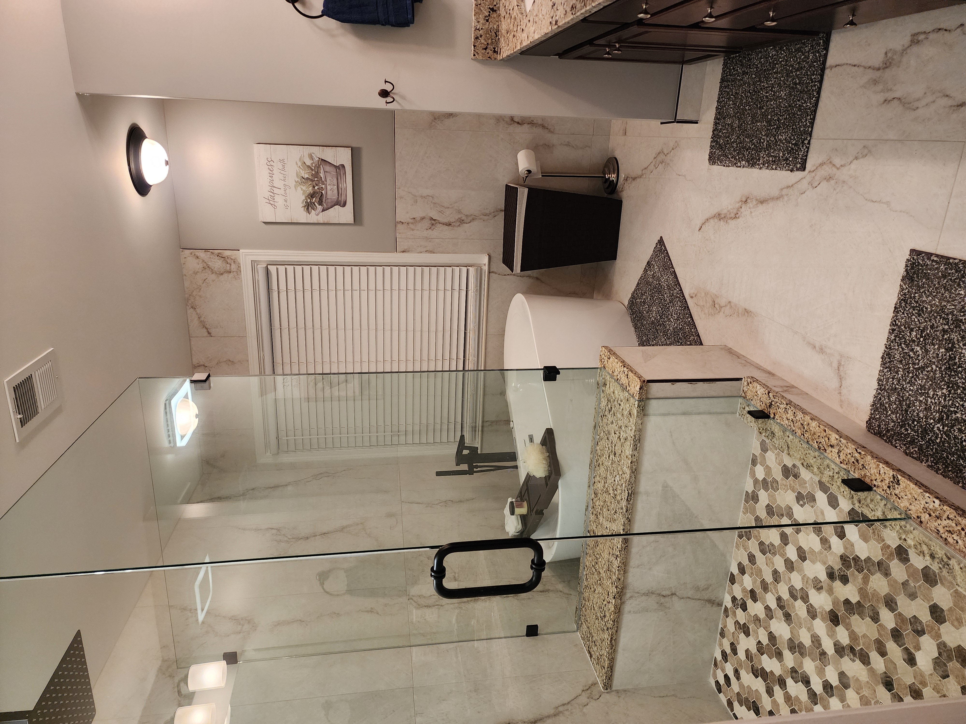 Custom kitchen remodel with modern range hood, cabinets, and backsplash Cartersville GA