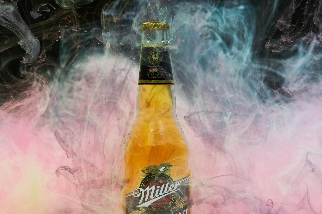 beer bottle engulfed in smoke