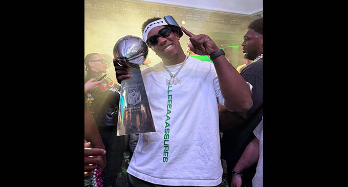 KJ with Superbowl trophy