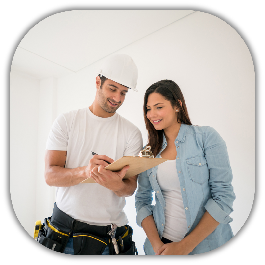 Residential contractor in a hard hat and tool belt discussing project details with a smiling client, representing professional service and value communication in home renovation contracting.