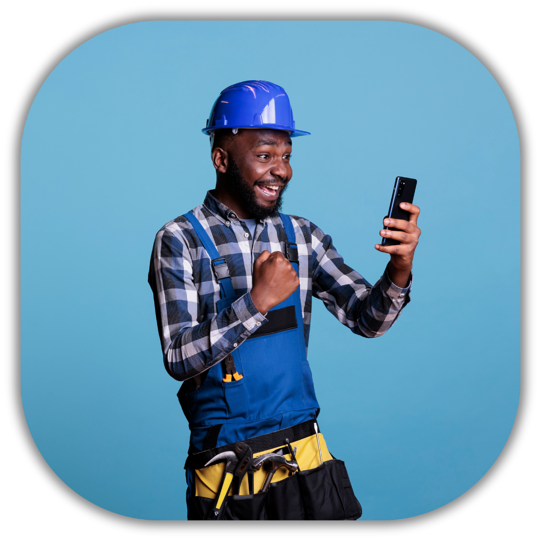 Happy contractor in a hard hat and work gear celebrating while looking at his phone, representing the excitement of receiving valuable bonuses and additional benefits from the Superbly service, including discounts and exclusive resources for residential contractors.​