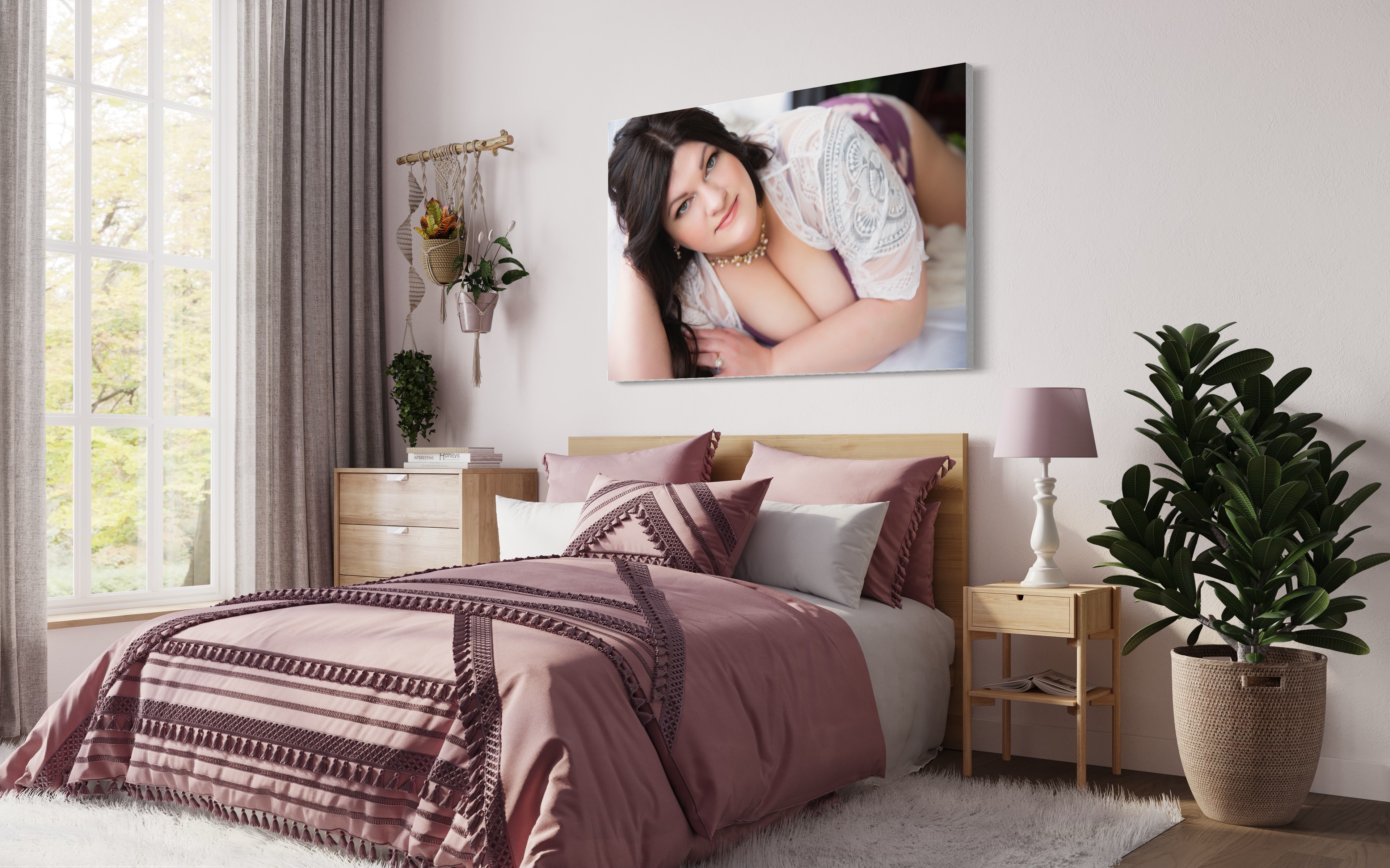 photo of bedroom with boudoir canvas on wall