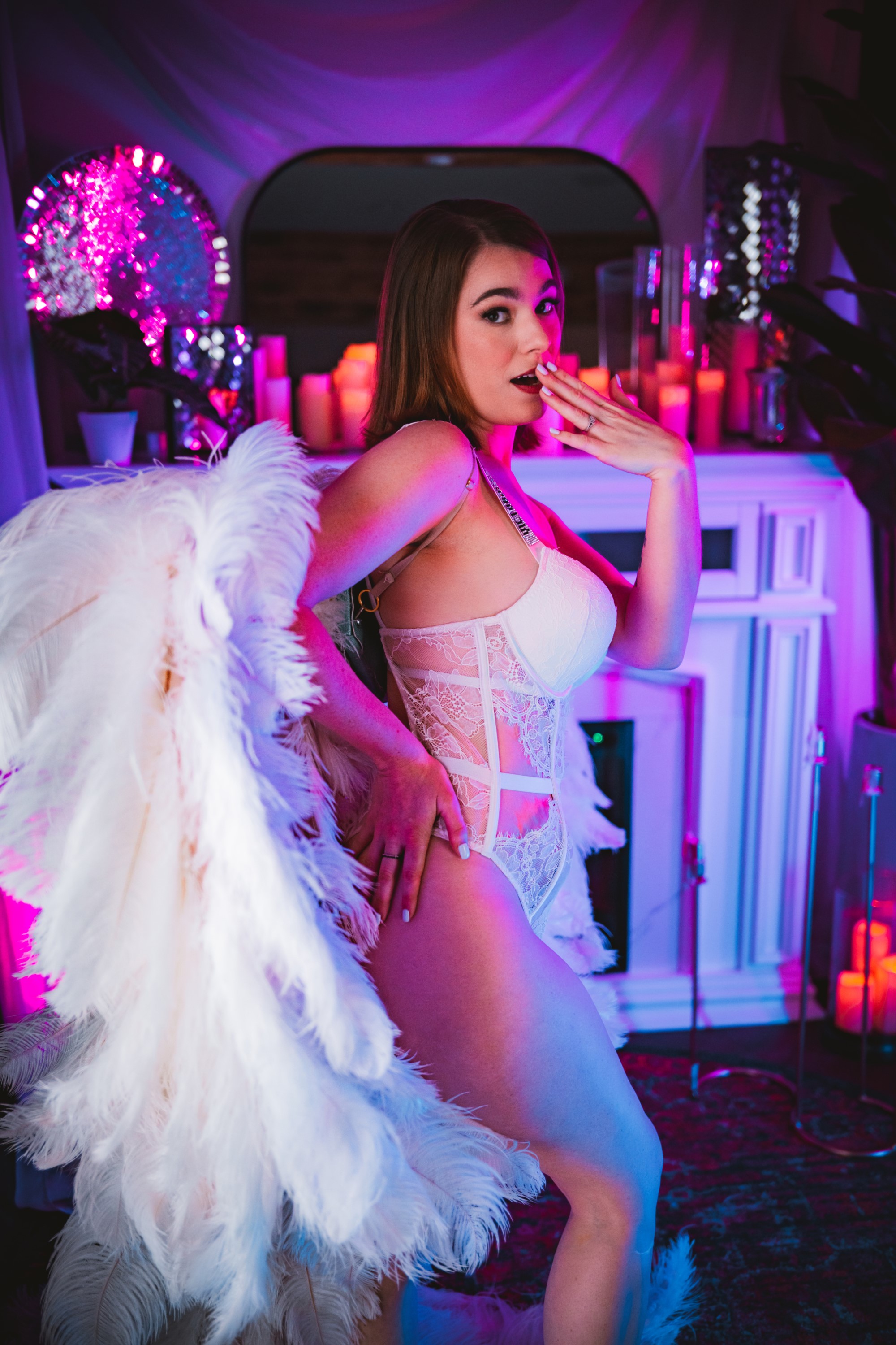 woman in white lingerie and white angel wings