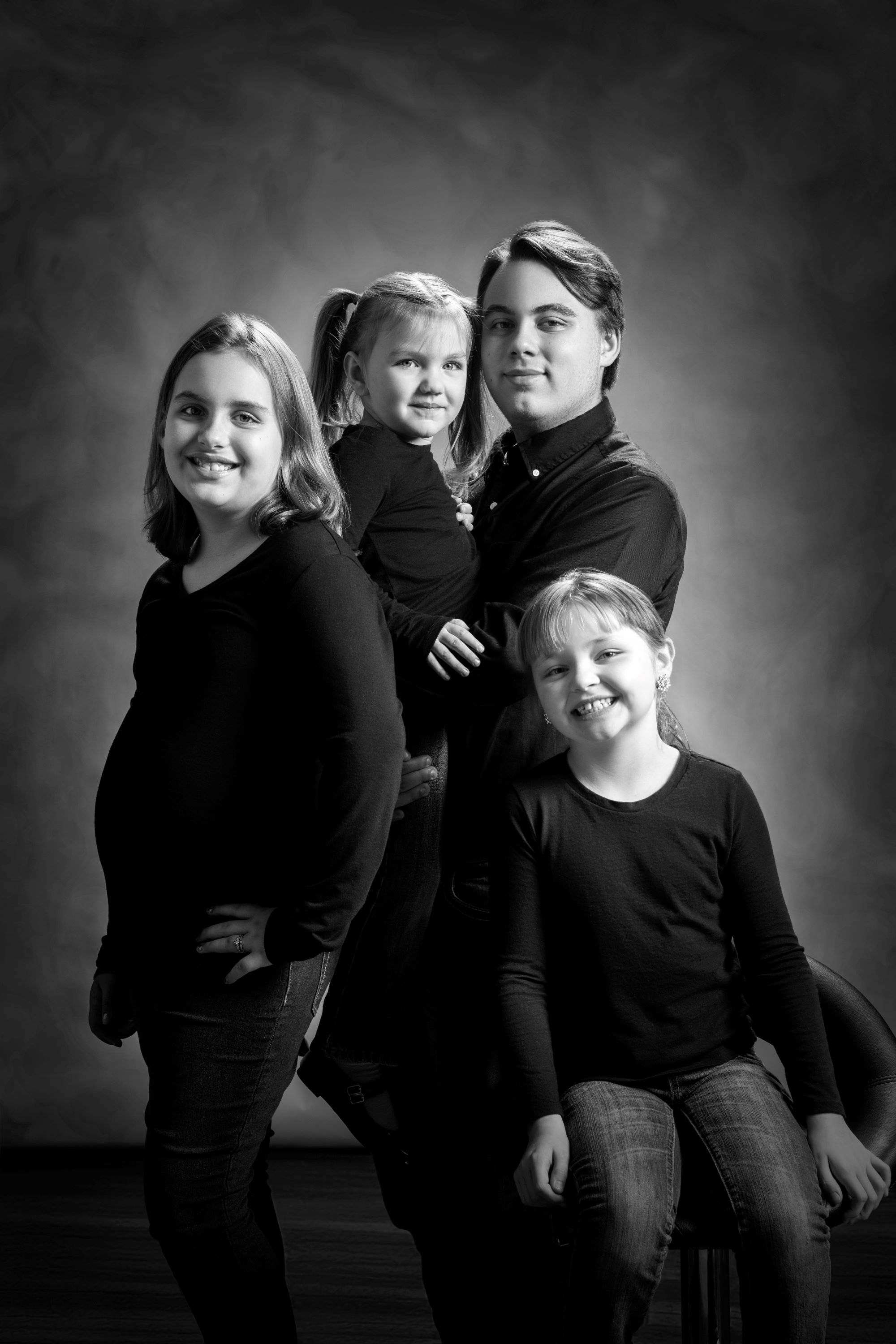 black and white image of siblings
