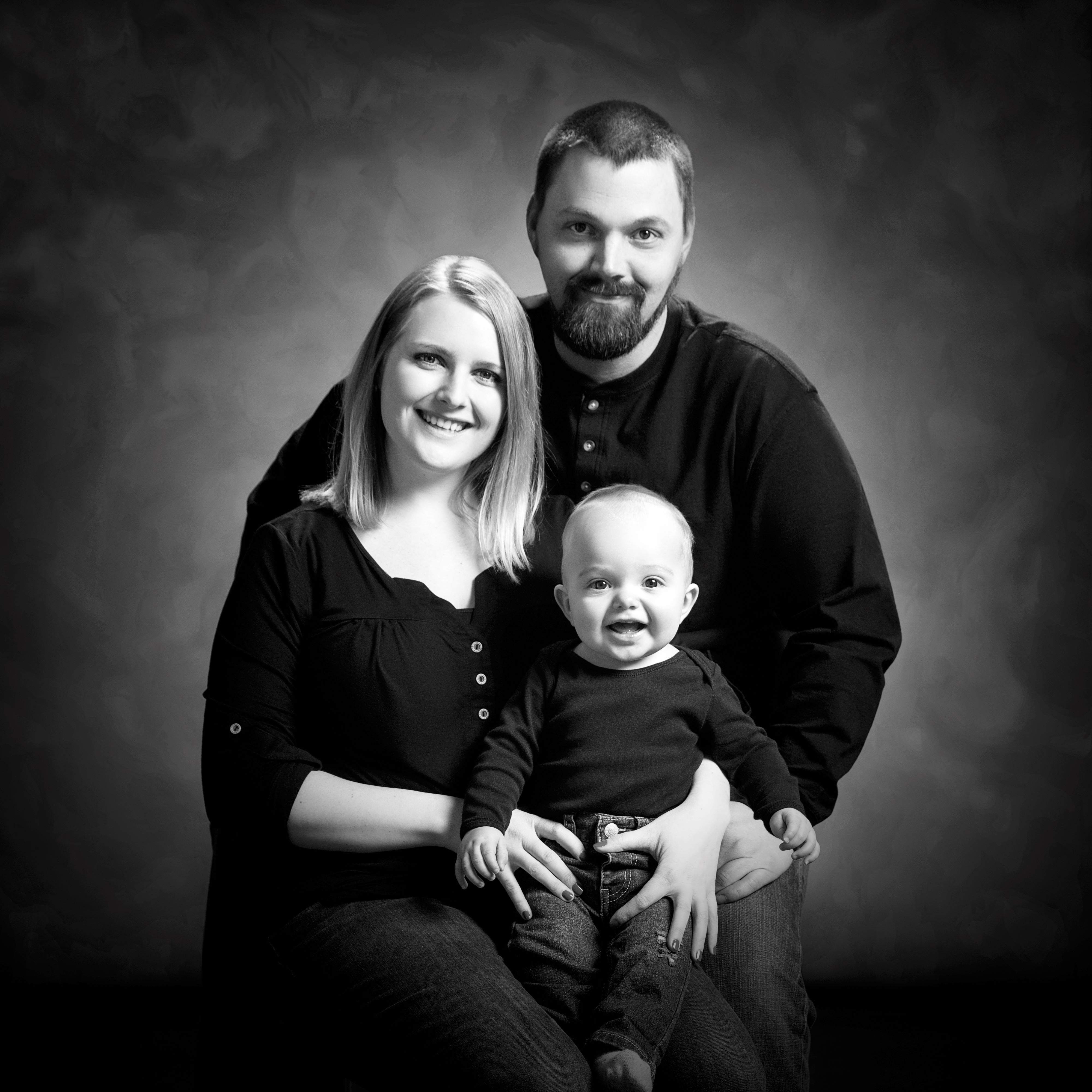 black and white studio family portrait