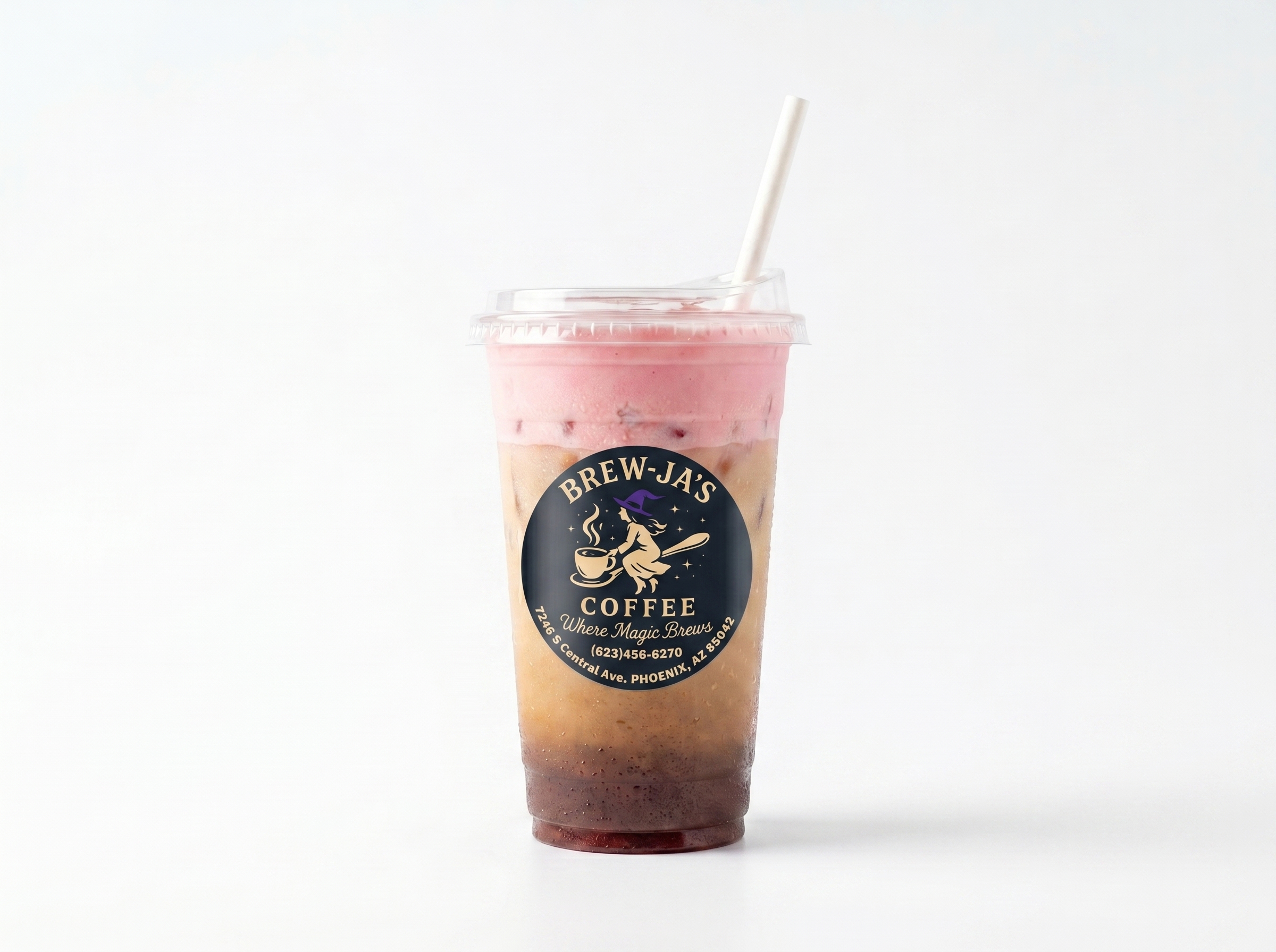Layered pink and purple iced latte with white straw