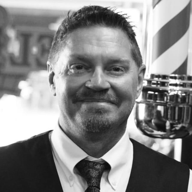 Mike, barber at Primo's Barber Shop in Jupiter, FL