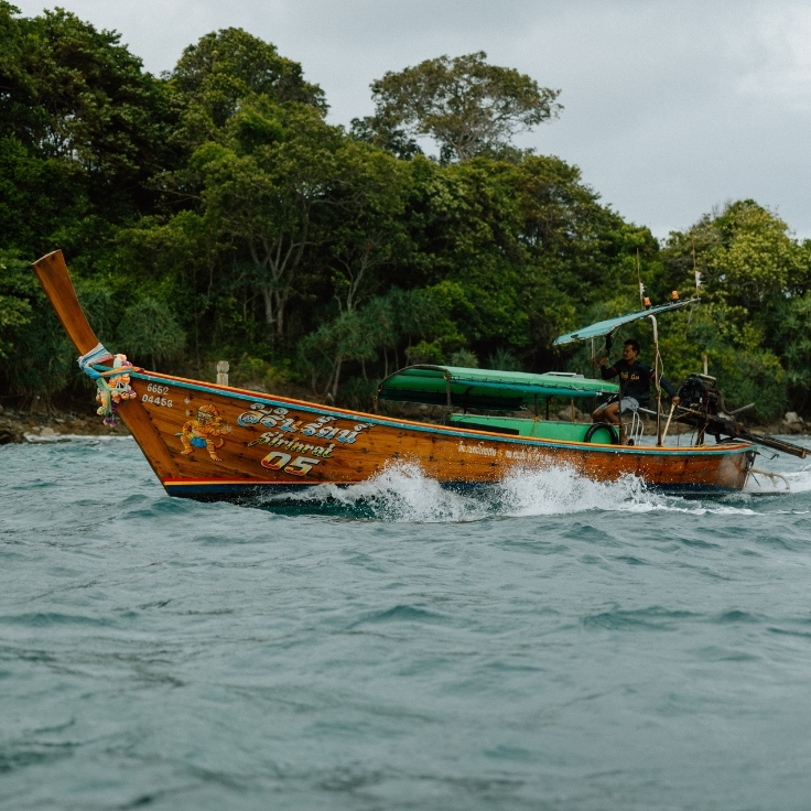 longtail boat in phi phi islands thailand