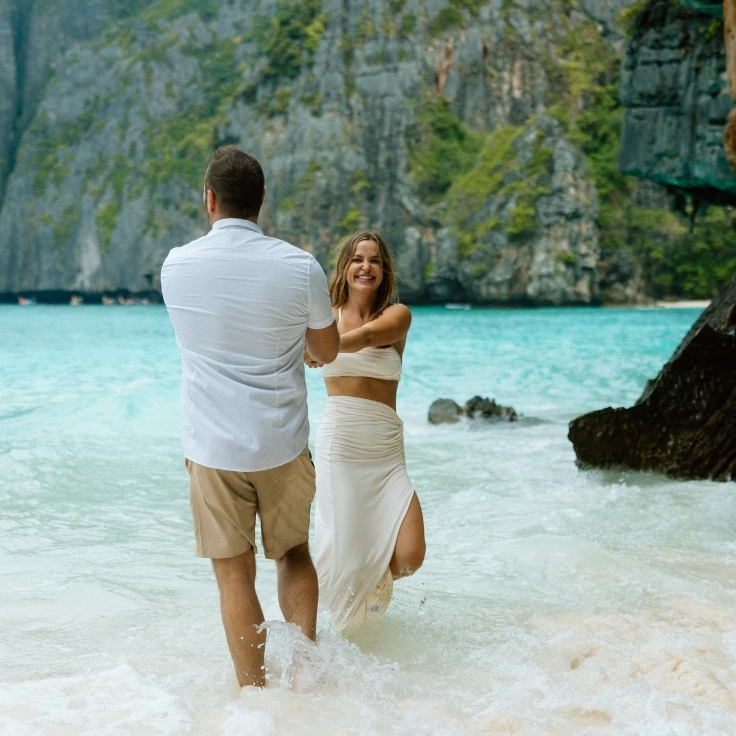 newlywed elopement couple on beach in maya bay phi phi islands thailand