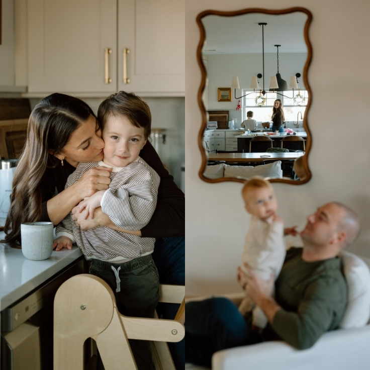 Mother kissing her young child in the kitchen during a lifestyle family session, with a soft reflection of the home in the background.