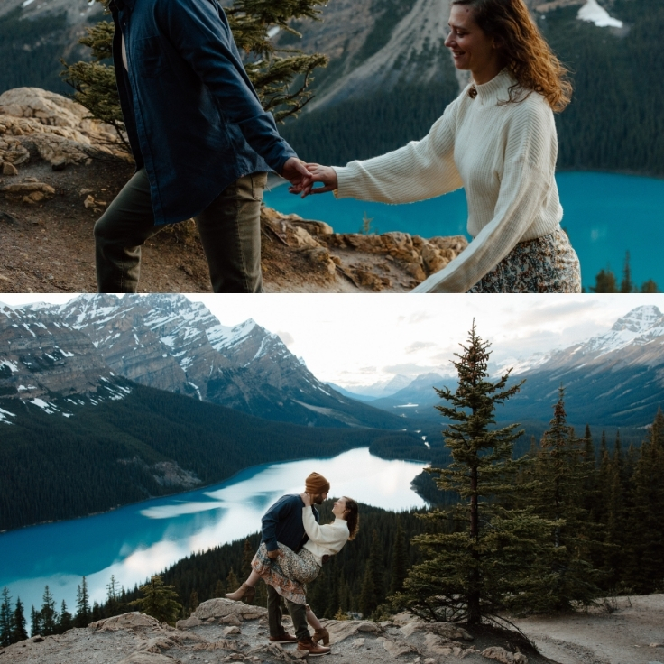 Couple holding hands and embracing above Peyto Lake during a romantic mountain engagement session in Banff National Park with panoramic Canadian Rockies views.