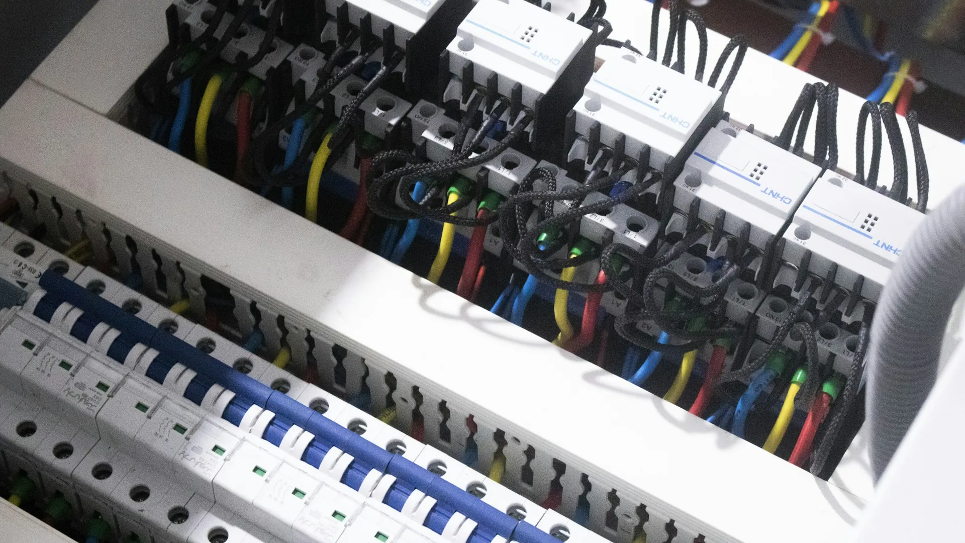 Electrician in Lees: circuit breakers and wiring in a panel