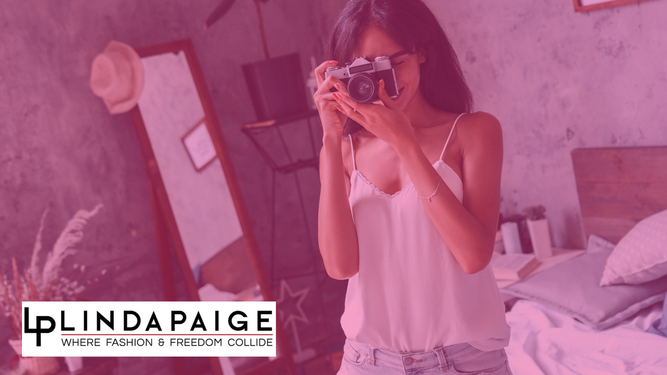 A woman taking a photo in the mirror