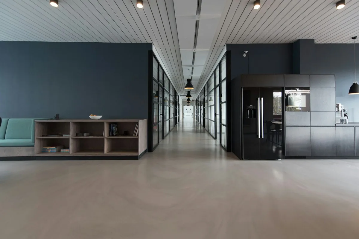 Quiet modern office with window light and empty desks