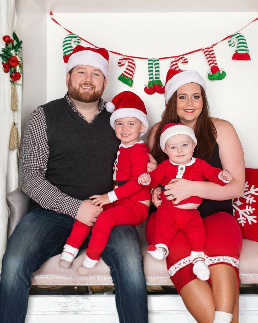 Rudy and Amanda with their family in holiday outfits