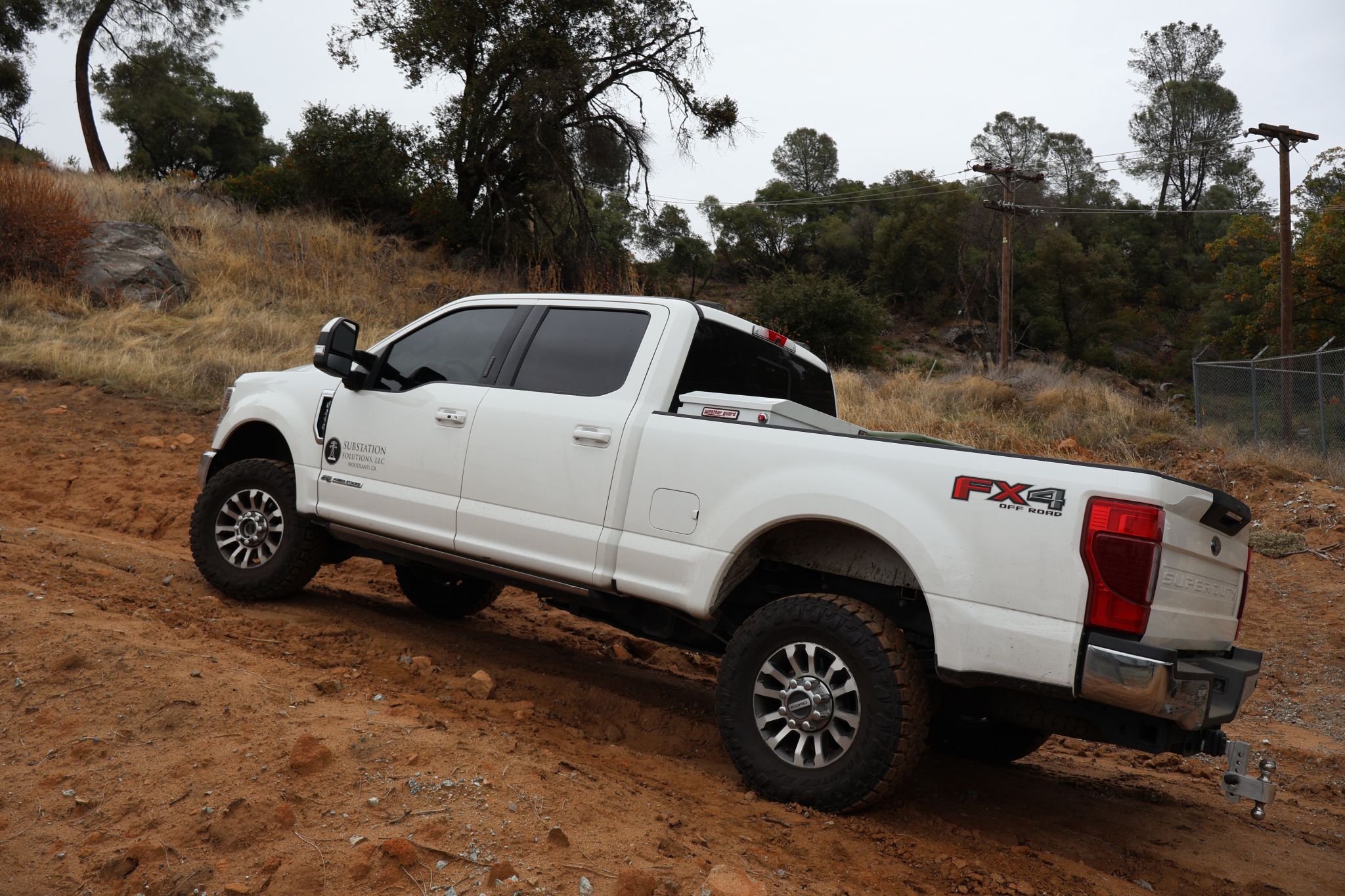 Substation Solutions work truck in the field at a substation site