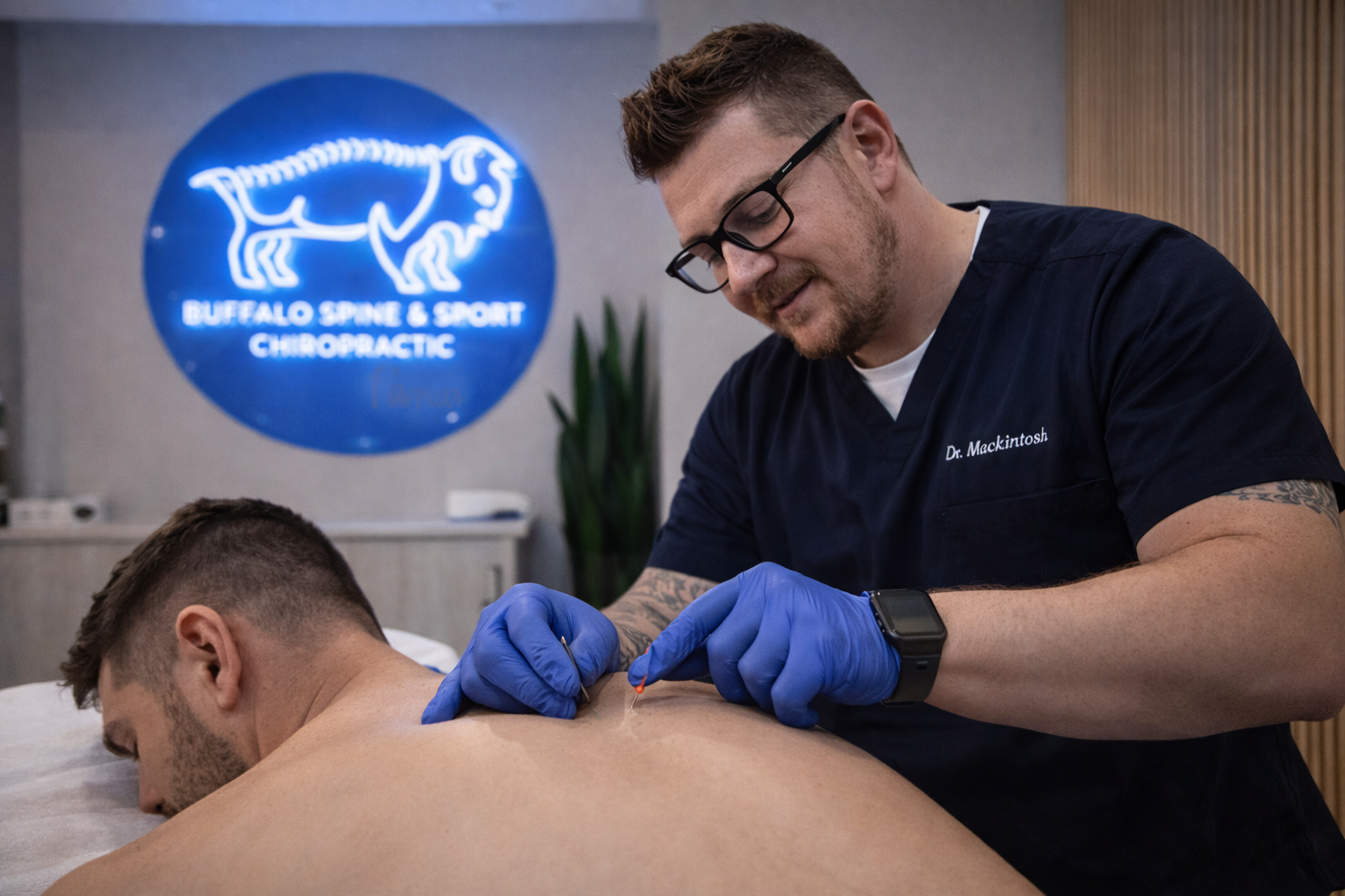 dr mac treating a man on the treatment table