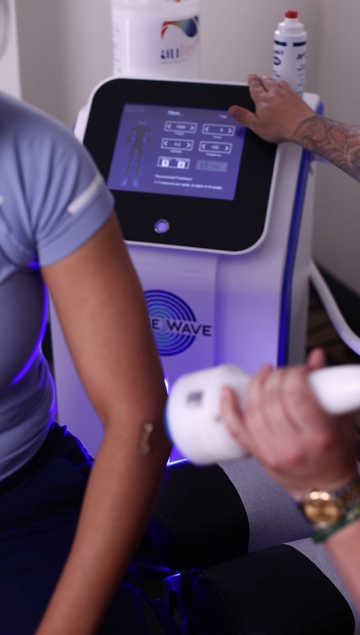 Physical therapist guiding a patient through dynamic spine rehabilitation