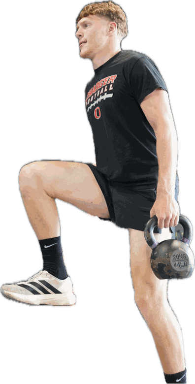 College athlete performing a loaded step-up