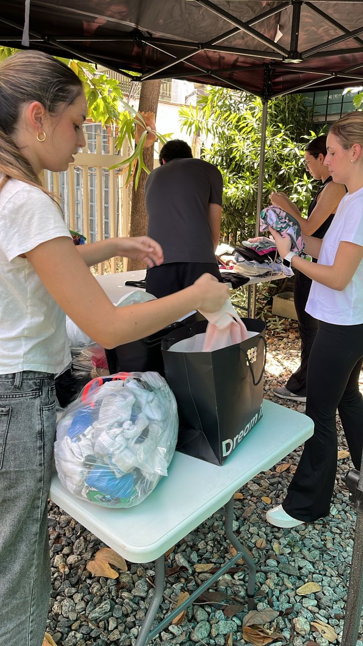 Volunteers preparing the donated supplies