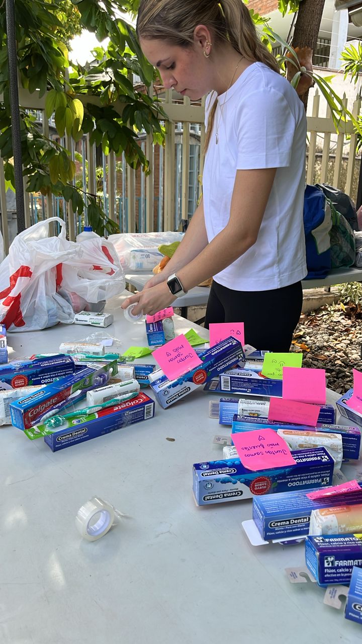 Volunteers preparing the donated supplies