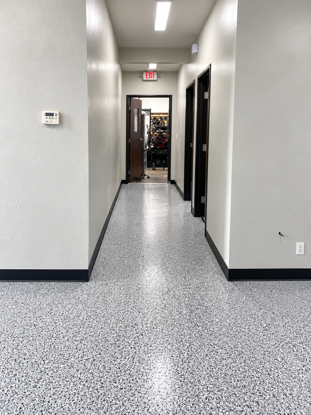 Premium Metallic Showroom — Decorative epoxy flooring finish by DFW Epoxy Finest