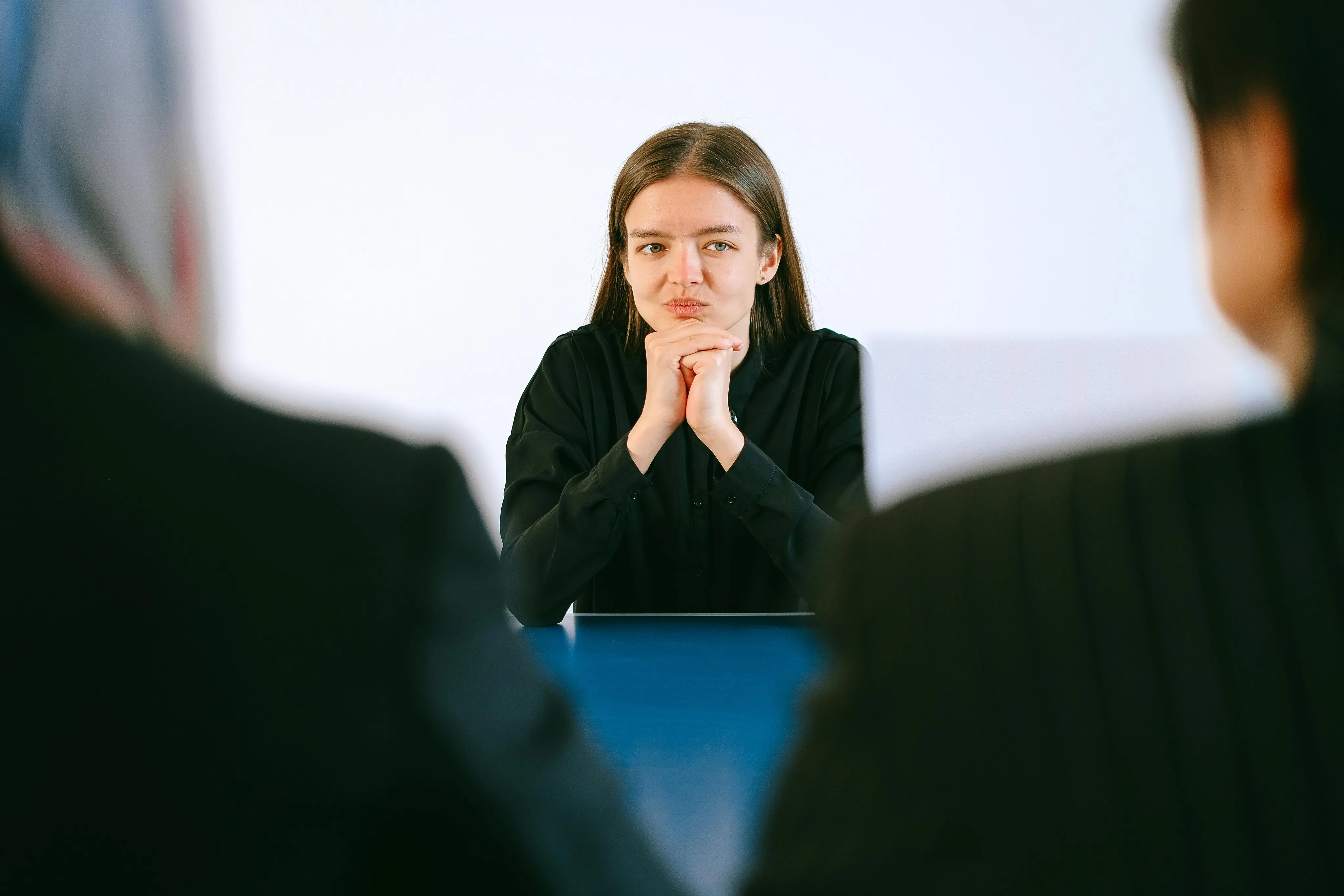 An image of a person looking at their interviewees; image from Pexel