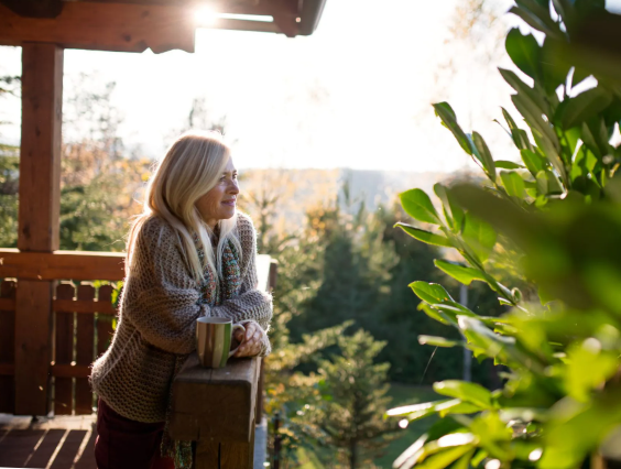 Women in the sunshine leaping into a new self 