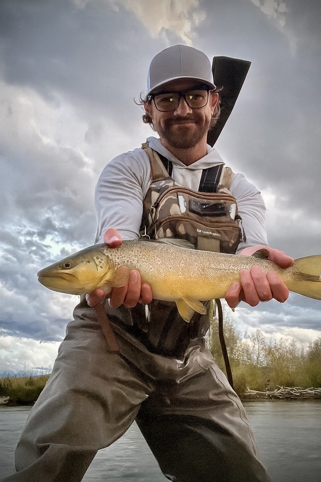 Patrick Svedin holding a trout