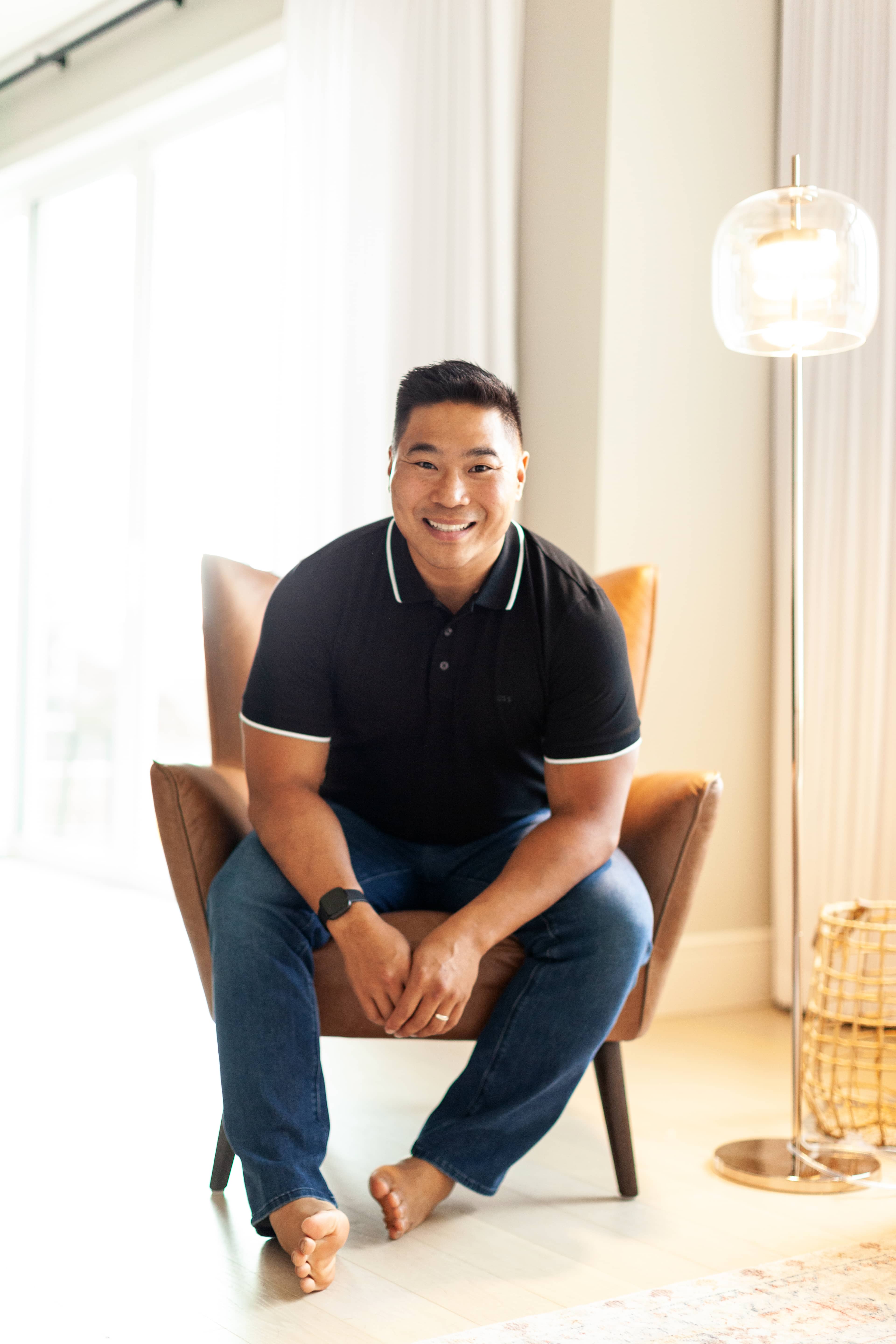 Kevin, founder of Up and Right Growth, seated and smiling in a bright room