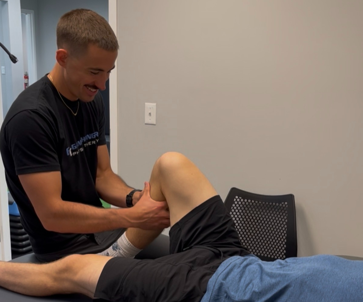 Patient working with a provider at a physical therapy clinic in Manalapan]