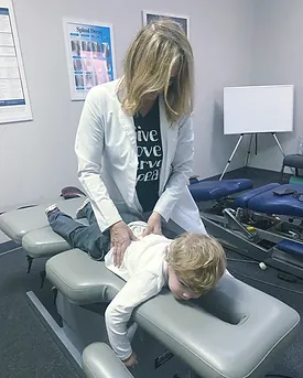 Dr. Barbara Hess, Chiropractor, and Pediatric Chiropractic Patient