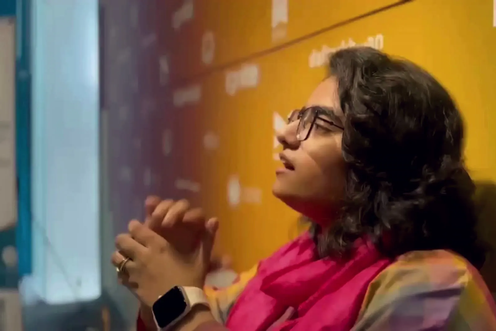 A participant listening during the Scale Her Business with AI workshop